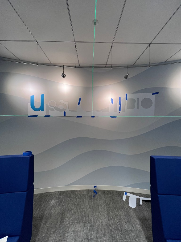 Dimensional Lettering installation using template and Laser Level